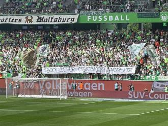 Spruchband der VfL Wolfsburg-Fans zum Thema.